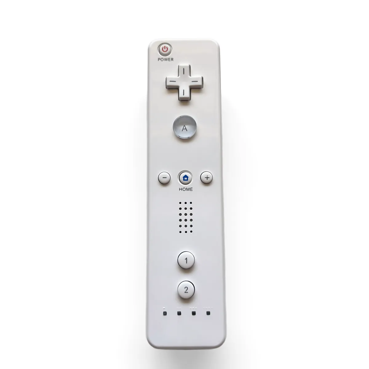 Wii Remote face down on the mat with the wrist strap removed, B trigger facing up