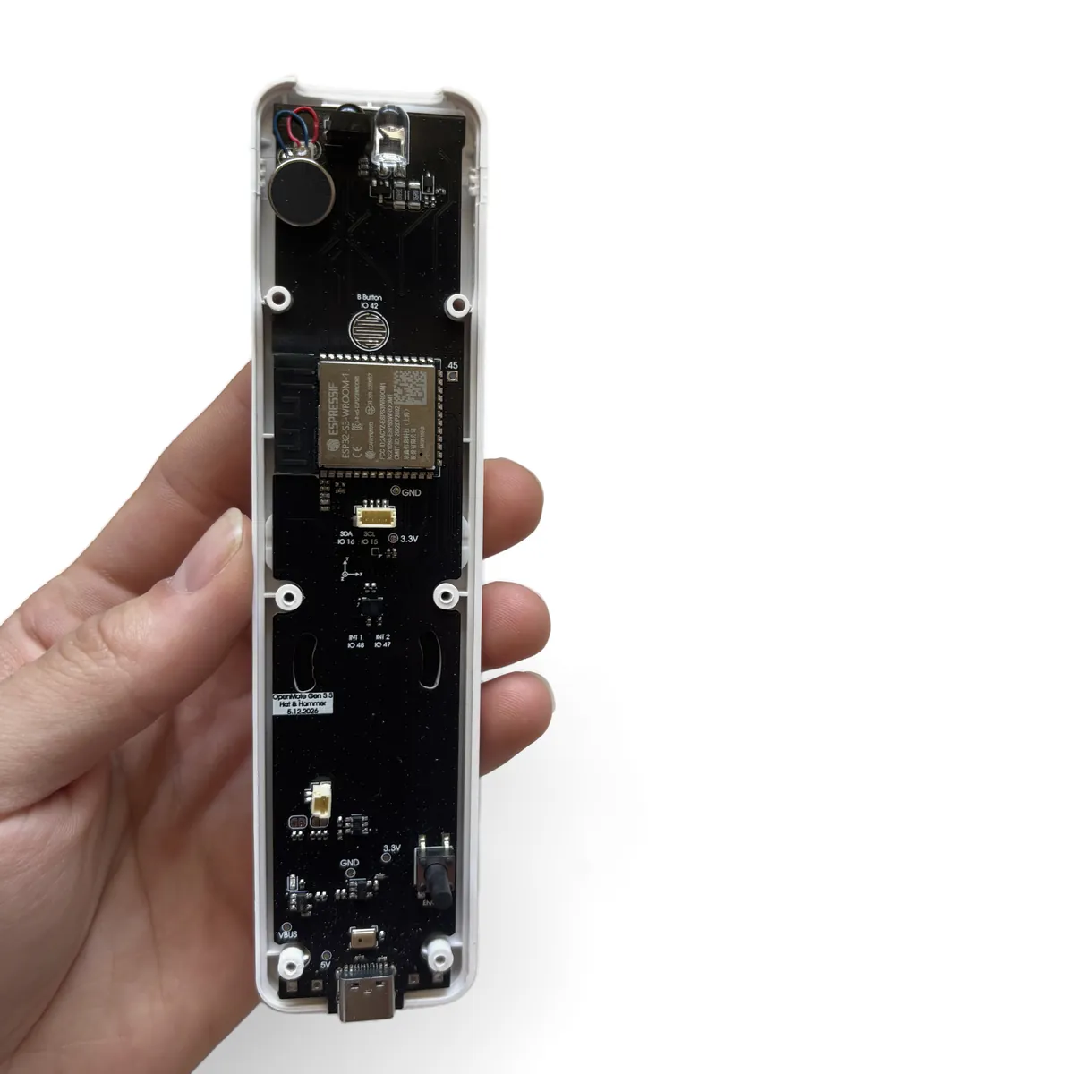 OpenMote board in the top shell with the six mounting holes circled in yellow over the shell posts