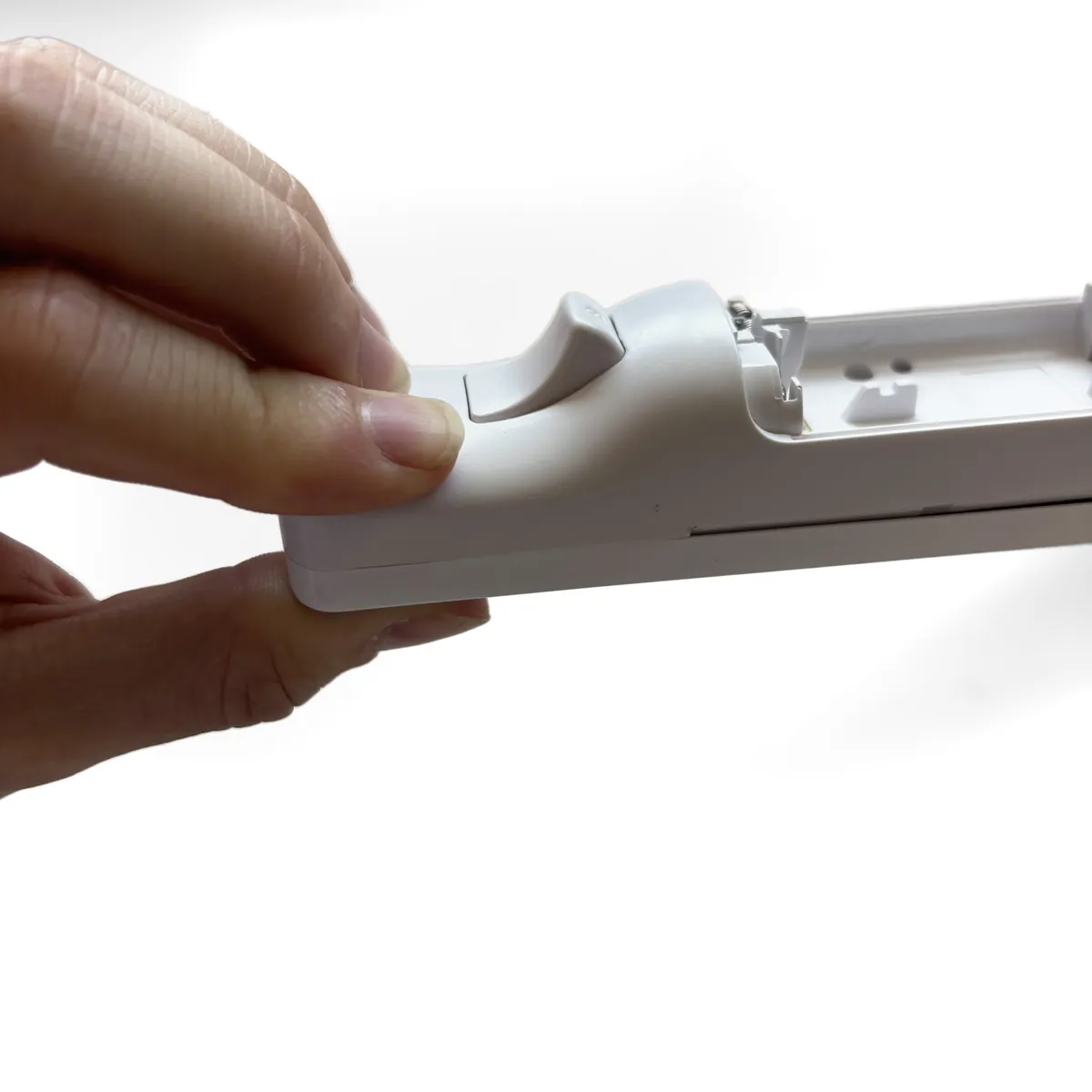 Seam closed along one side of the remote